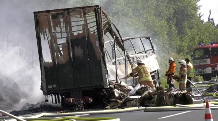 Tour bus bursts into flames after collision in Germany; 18 killed