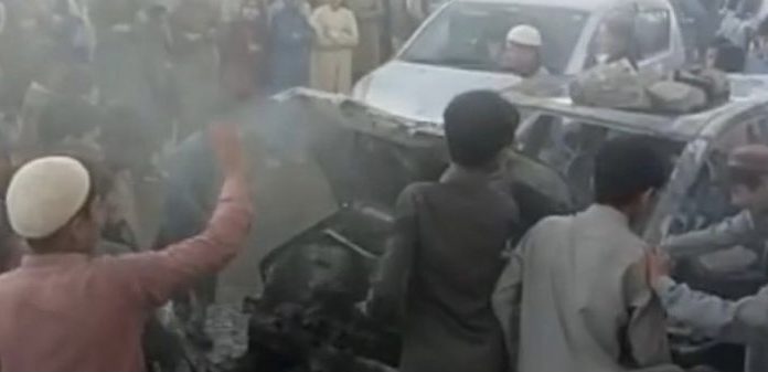 Pishin: Mob burns vehicle of rival politician during by-polls