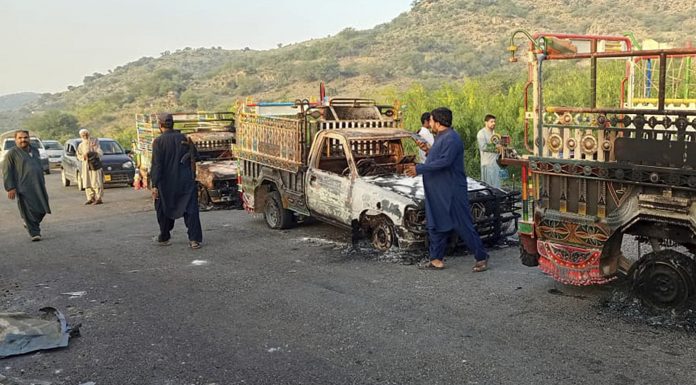 Armed Men Block Kolpur Highway, Disarm Forces, and Set Factory Ablaze